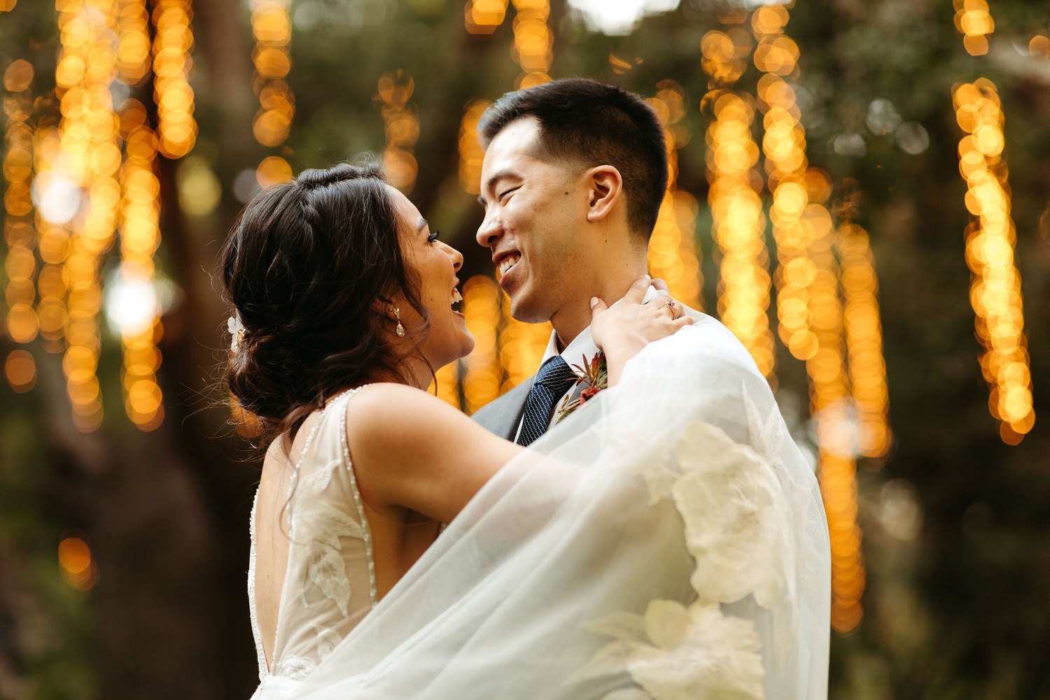 calamigos ranch pavilion wedding ceremony with hanging lights in trees