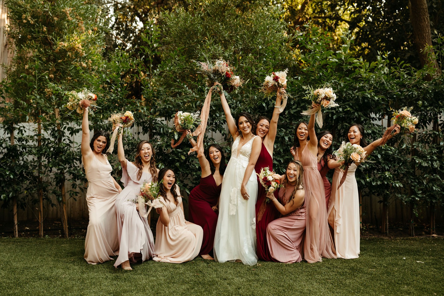 fun bridesmaids photos in blush tones