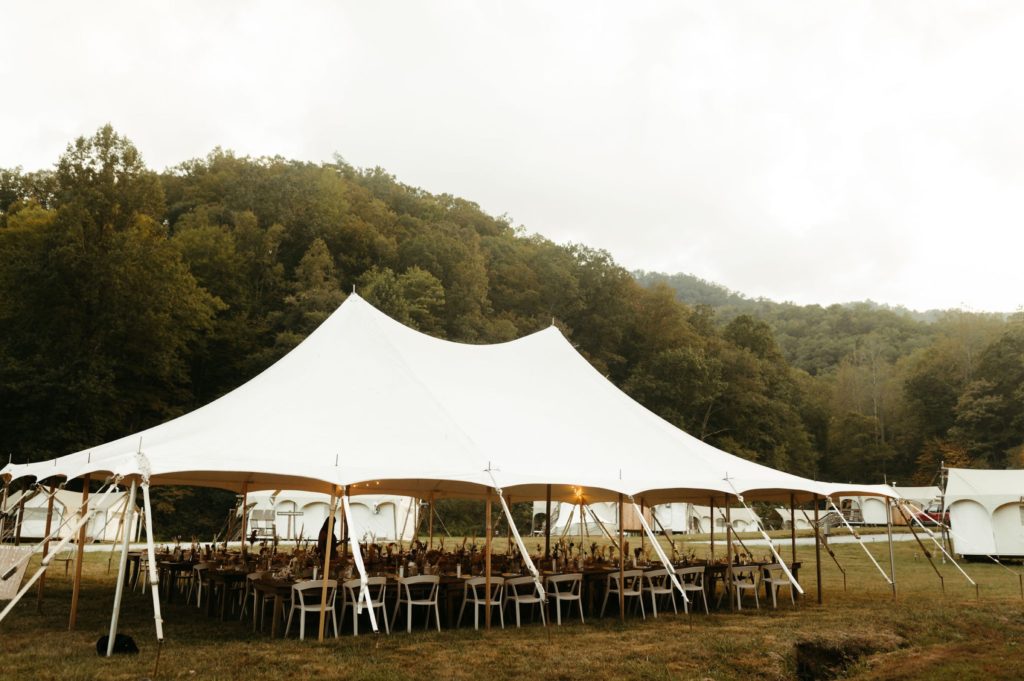 outdoorsy wedding reception white tent 