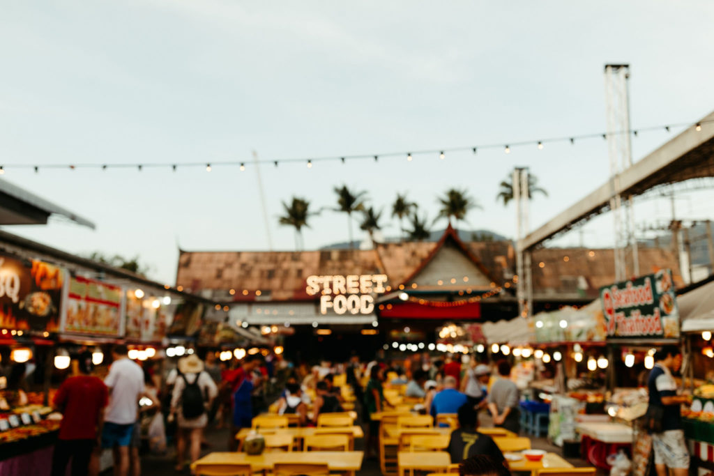 street food night market at patong beach in thailand