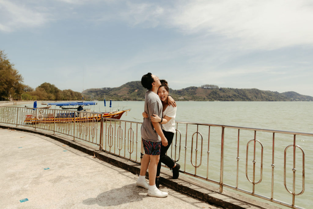 couple hugging in phuket thailand